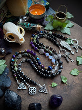 Load image into Gallery viewer, At the Crossroads - Witch’s Ladder, Altar Beads - Onyx, Snowflake/Smoky Obsidian, Iolite, Hematite - Triquetra, Keys Goddess