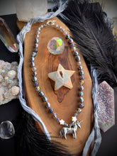 Load image into Gallery viewer, Head in the Clouds - 18” Necklace 8mm Peacock Pearls, Tanzanite, Iolite, Mystic Silverite, Mother of Pearl Stars, Czech Glass + Pewter Unicorn Focal