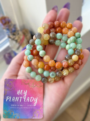 Reawaken to Joy - Rainbow Sunstone, Peach Aventurine, Kiwi Jasper, Green Garnet, Golden Rutile Quartz, Yellow Opal, Black Moonstone Gemstone Bracelet