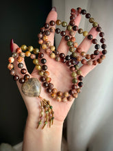 Load image into Gallery viewer, Whispers of Forest Magic 🍂🍁 - 8mm Birds Eye Rhyolite, Green Garnet, Hessonite Garnet, Tigers Eye, - 108 Mala Necklace - Moonstone Heart Focal - Tourmaline Beaded Tassel
