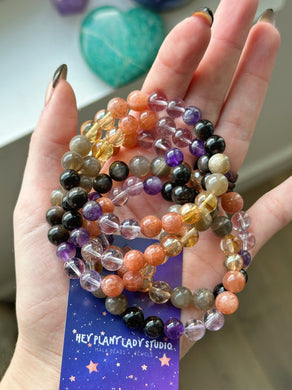 Reserved - Glow From Inside  - 8mm Rainbow Lattice Sunstone, Lavender Amethyst, Deep Purple Amethyst, Silver Sheen Obsidian, Honey Citrine, Titanium Quartz, Grey Sunstone Gemstone Bracelet