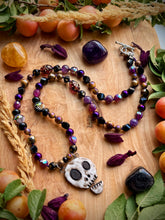 Load image into Gallery viewer, 💀 Muerto Magico - 23” Necklace - Amethyst, Mystic Tigers Eye, Onyx, Hematite - Artisan Ceramic Skull 42mm