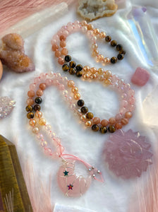 The Solar Witch  - 8mm - Rose Quartz, Aura Rose Quartz, Aura Quartz, Aura Citrine, Tigers Eye, Peach Moonstone - 108 Mala Necklace - Rose Quartz Moon Focal (pink/green stars)