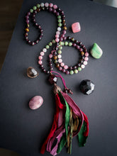 Load image into Gallery viewer, Root &amp; Bloom - Garnet Focal - 108 Mala Necklace- Garnet, Rose Quartz, Moonstone, Green Apatite, Lepidolite, Tigers Eye - Sari Silk Tassel