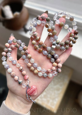 Amplified Intuition  - 108  Pink Rhodochrosite, AAA Faceted Quartz, Honey Brown Rhodochrosite, Iolite, White Moonstone & Grey Sunstone Gemstone Meditation Beads - AAA Rhodochrosite Heart Focal