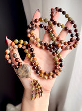 Load image into Gallery viewer, Whispers of Forest Magic 🍂🍁 - 8mm Birds Eye Rhyolite, Green Garnet, Hessonite Garnet, Tigers Eye, - 108 Mala Necklace - Moonstone Heart Focal - Tourmaline Beaded Tassel
