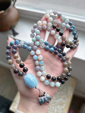 Ocean’s Depths - Aquamarine Guru + Aquamarine, Devil Blue Aquamarine, Grey Sunstone, White Moonstone, Silver Sheen Obsidian, Dark Blue & Light Blue Iolite - 108 Mala Necklace