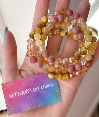 Radiant Manipura -  8mm Yellow Aura Quartz, Honey Citrine, Honey Calcite, Golden Tigers Eye, Gold Aura Quartz and Rhodonite - Gemstone Stretch Mala Bracelet