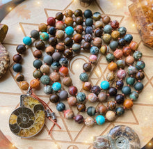 Load image into Gallery viewer, Dancing in Nature - 108 - Saddle Agate, Ammonite, Genuine Turquoise, Polychrome Jasper, Sandalwood, Picture Jasper, Fossil Agate, Ocean Jasper, Pietersite, Petrified Wood