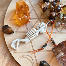 Load image into Gallery viewer, Glowing Embers Mala Necklace - 108 Fire Quartz + Gold Aura Quartz + Tigers Eye + Bronzite Olivin +Hand Carved Buffalo Bone Skeleton