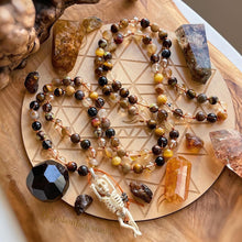 Load image into Gallery viewer, Glowing Embers Mala Necklace - 108 Fire Quartz + Gold Aura Quartz + Tigers Eye + Bronzite Olivin +Hand Carved Buffalo Bone Skeleton