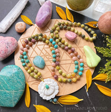 Load image into Gallery viewer, Rooted in Compassion - Carved Shell Lotus + Turquoise - Lavender Kunzite + Sunstone + Yellow Opal + Moonstone + Turquoise + Yellow Turquoise