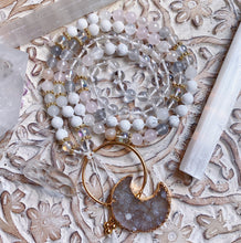 Load image into Gallery viewer, Meditating Goddess Mala Necklace - 108 beads - Selenite + Rose Quartz + Howlite + Clear Quartz + Mystic Rose Quartz + Aura Quartz