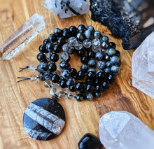 Load image into Gallery viewer, Spiritual Alchemy - 108 - Eagle Eye, Onyx, Snowflake Obsidian, Clear Quartz, Hematite, Orthoceras Fossil
