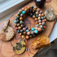 Load image into Gallery viewer, Dancing in Nature - 108 - Saddle Agate, Ammonite, Genuine Turquoise, Polychrome Jasper, Sandalwood, Picture Jasper, Fossil Agate, Ocean Jasper, Pietersite, Petrified Wood