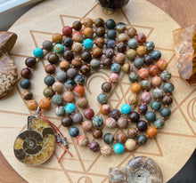 Load image into Gallery viewer, Dancing in Nature - 108 - Saddle Agate, Ammonite, Genuine Turquoise, Polychrome Jasper, Sandalwood, Picture Jasper, Fossil Agate, Ocean Jasper, Pietersite, Petrified Wood