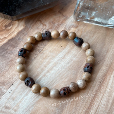Davy Jones' Locker - 8mm Wood Skulls + Sandalwood - Stretch Bracelet