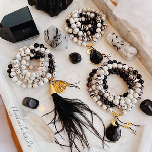 Golden Glamour - Antique Gold Buddha Coin, 24K Gold Black Feather Tassel, Mystic Rose Quartz, Dalmatian Jade, Black Tourmaline, Freshwater Pearls