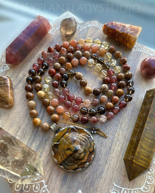 Passion + Confidence - Petrified Wood, Hematoid Quartz, Strawberry Quartz, Smoky Quartz, Citrine, Moonstone 108 Mala Necklace - Tibetan Tigers Eye Carving