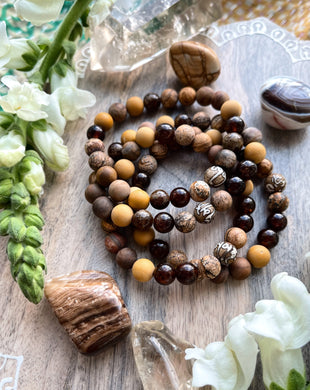 Follow the Sun - Tibetan OM Conch Shell, Brown Garnet, Picture Jasper, Petrified Wood, Mookaite Jasper Gemstone Stretch Mala Bracelet