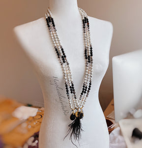 Golden Glamour - Antique Gold Buddha Coin, 24K Gold Black Feather Tassel, Mystic Rose Quartz, Dalmatian Jade, Black Tourmaline, Freshwater Pearls
