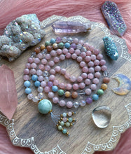 Load image into Gallery viewer, Sunset Reflections - 108 Mala Bead Necklace - AAA Clear Quartz, Aura Rose Quartz, Lavender Amethyst, Aquamarine, Grossular Garnet, Peach Moonstone, Golden Mother of Pearl, Aura Quartz